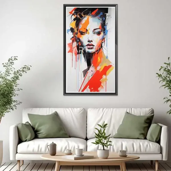 Tableau visage de femme sur un mur blanc