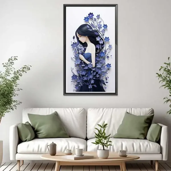 Tableau un papier découpé d'une femme entourée de fleurs bleues