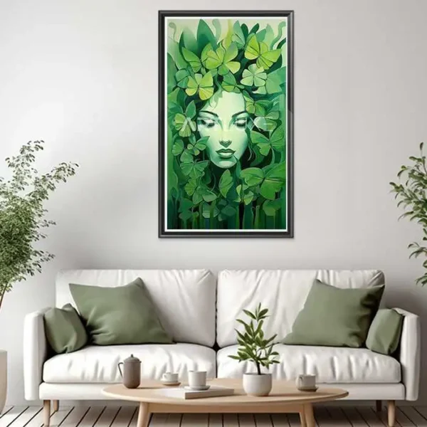 Tableau représentant un visage de femme entouré de feuilles