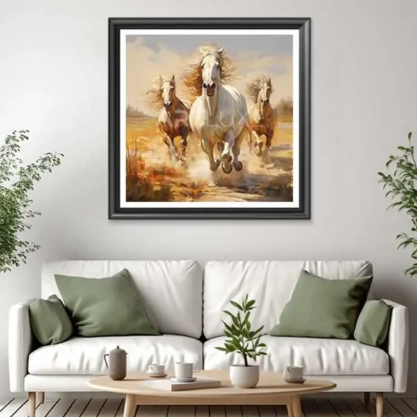 Tableau de trois chevaux courant dans un champ